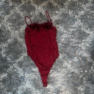 Red feathered top bodysuit